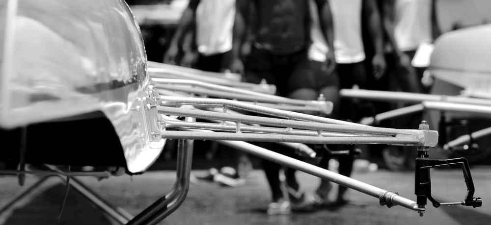 Oars stacked at the boathouse